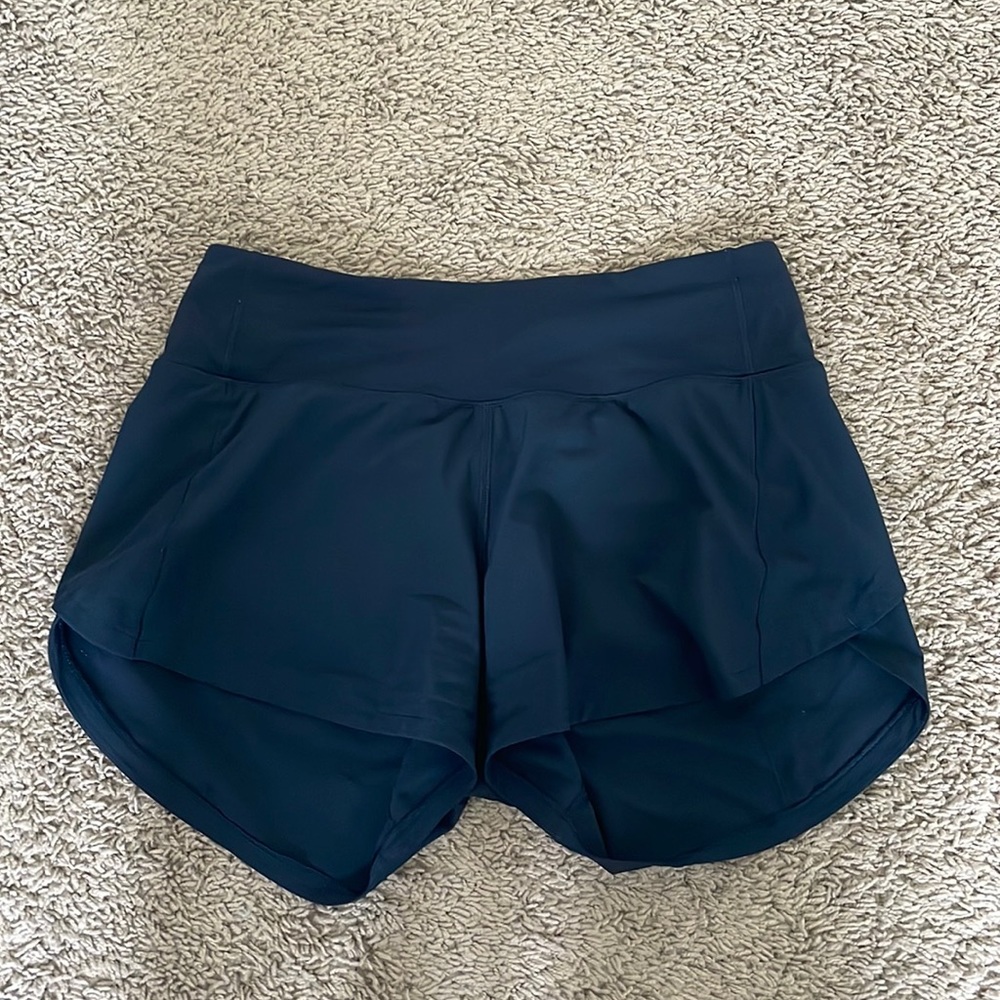 lululemon speed up mid rise lined 4 inch true navy blue size 4 shorts